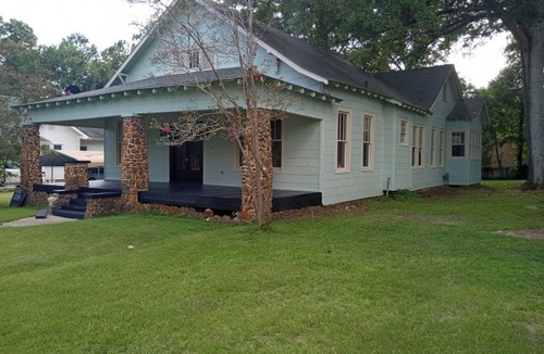 McComb House | Cozy single family home overflowing with Southern charm and modern appeal.