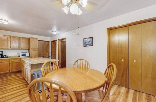 Friendship House | Cozy wooded duplex w/WiFi, full kitchen, shared W/D & near lakes & trails