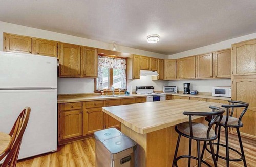 Friendship House | Cozy wooded duplex w/WiFi, full kitchen, shared W/D & near lakes & trails