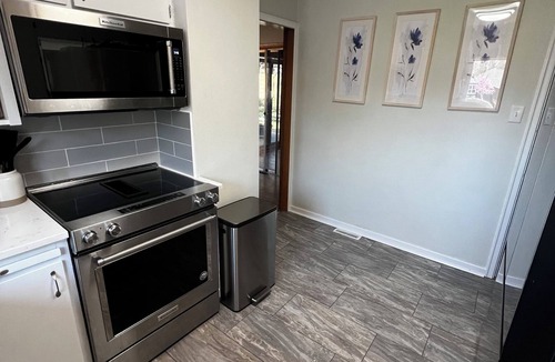 Ames House | Cute 4 Bedroom Home with 2 Gorgeous Bathrooms Close to Stadium