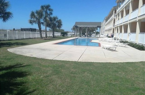 Dauphin Island Condo | Dauphin Island Beach Club 101A Walk right out to Pools and Beach!