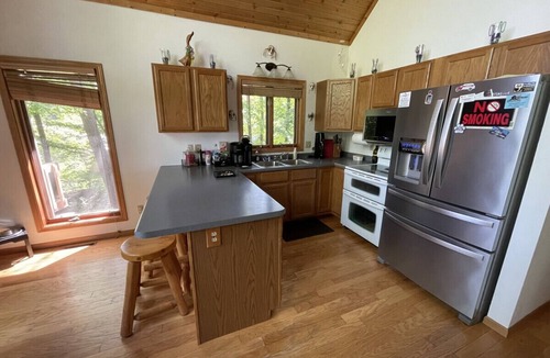 Leland Ski Chalet | Dells area pet-friendly lake house w/HOT TUB! (and boat avail.)