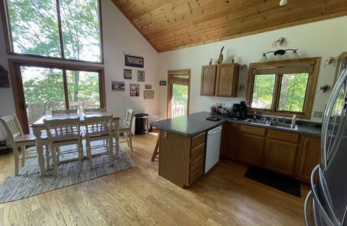 Leland Ski Chalet | Dells area pet-friendly lake house w/HOT TUB! (and boat avail.)