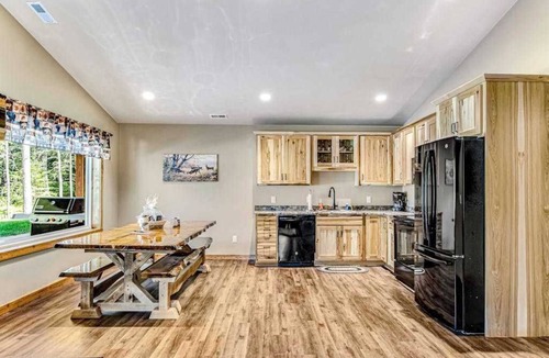 Conover House | Dog-friendly cabin with hot tub, fireplace, patio, grill, central AC, & W/D