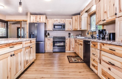 Arbor Vitae House | Dog-friendly, lakefront retreat with a dock, washer/dryer, central AC, & firepit