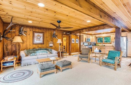 Manitowish Waters House | Dog-friendly, lakefront getaway w/a wraparound balcony, beach, & boat access