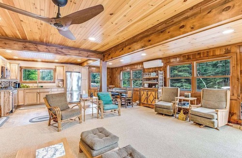 Manitowish Waters House | Dog-friendly, lakefront getaway w/a wraparound balcony, beach, & boat access