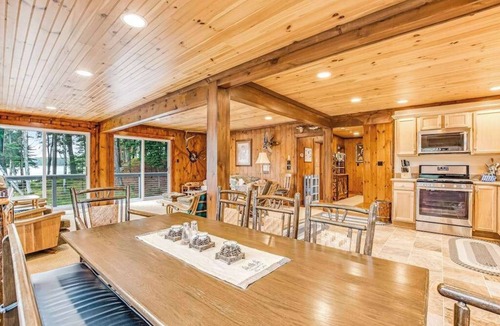 Manitowish Waters House | Dog-friendly, lakefront getaway w/a wraparound balcony, beach, & boat access