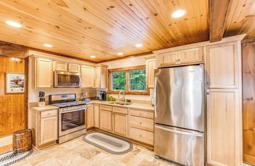 Manitowish Waters House | Dog-friendly, lakefront getaway w/a wraparound balcony, beach, & boat access