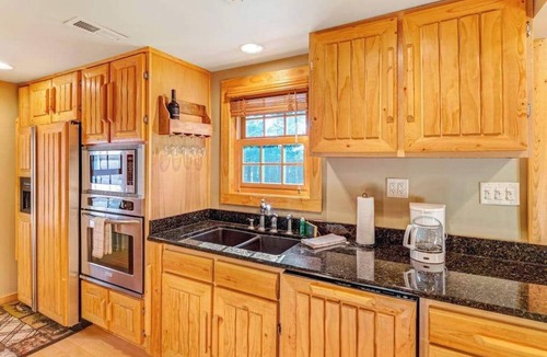 Eagle River House | Dog-friendly waterfront cabin w/wood-burning fireplace, boat dock, & firepit
