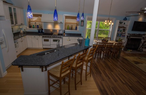Ocean Springs House | Enchanting Spacious Beach House With Hot Tub, Game Room, Tiki Bar & Fishing Dock