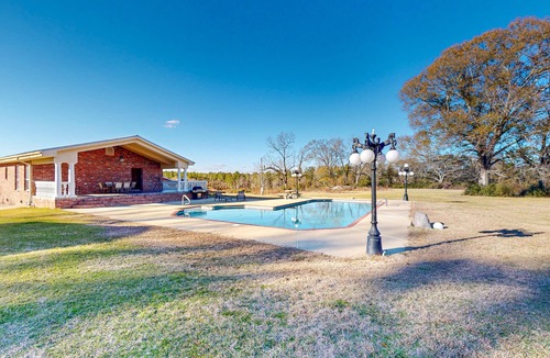 Magnolia House | Expansive property with two homes, ponds, pool, game tables, & hiking trails