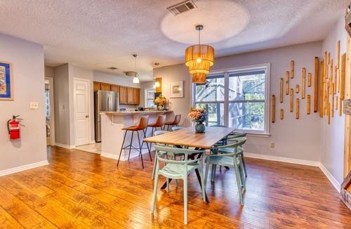 Ocean Springs House | Family-friendly Retreat! Screened-in, Heated Pool a mile from the Gulf of Mexico