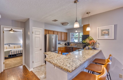 Ocean Springs House | Family-friendly Retreat! Screened-in, Heated Pool a mile from the Gulf of Mexico