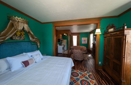 Sturgeon Bay Hotel | Glamorous King bed Suite! RuPaul inspired stylings.