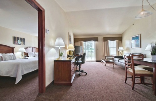 Pembine Hotel | Group Escape x3 | Riverfront Resort w/Pool, Spa & Tennis Court! Pets Allowed!