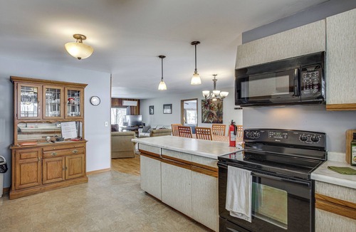 Waupaca House | Group Friendly! Riverfront Waupaca Retreat w/Yard