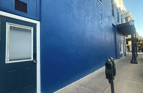Central Business District Apartment | Historic 1800s Dauphin Street Loft - Above Iconic 109-Year-Old Candy Shop