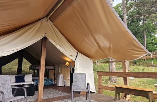 St Croix Falls RV Rental | Incredible Tented Cabin Ideal for Glamping with Fireplace and Barbecue in Saint Croix Falls, Wisconsin