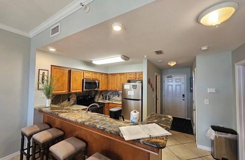 Dauphin Island Condo | Inn at Dauphin Island 109 Family Friendly Sleeps 8-Walk out to Pool and Beach