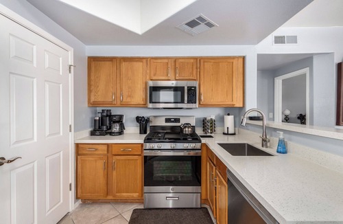 Maryvale Condo | KING Beds, Heated Community Pool! 3 miles from Cardinal Stadium!