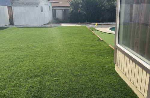 Lake Elsinore House | Lake view, pool, putting green