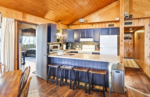 Nekoosa Cabin | Lakefront Cabin · Private Beach · Dog-Friendly