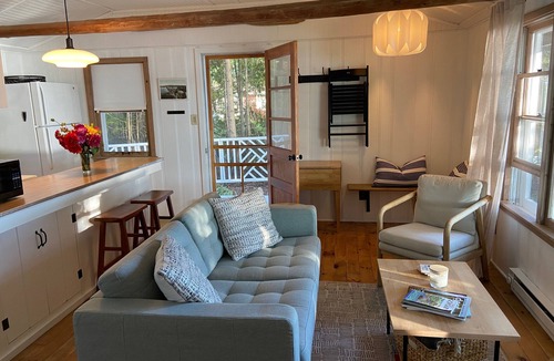 Baileys Harbor Cottage | Lakefront Cottage Retreat w/Private Dock, Paddle Boards, Fire Pit, Sunset Views