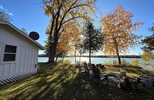 Baileys Harbor Cottage | Lakefront Cottage Retreat w/Private Dock, Paddle Boards, Fire Pit, Sunset Views