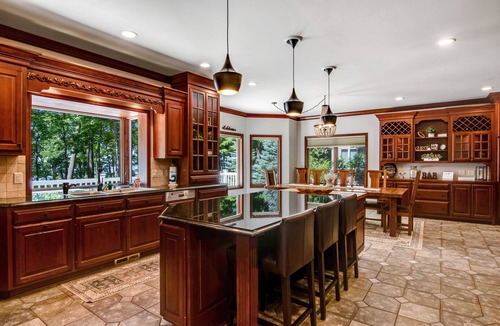 Arkdale House | Lakefront estate with firepit, grill, game room & sauna - near Sand Valley Golf