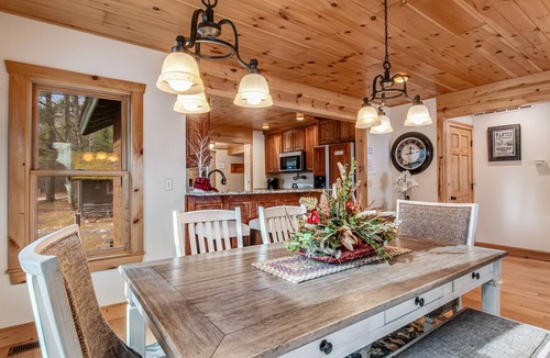 Manitowish Waters House | Lakefront home in a great location with docks, private beach, sauna & firepit