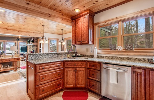 Manitowish Waters House | Lakefront home in a great location with docks, private beach, sauna & firepit