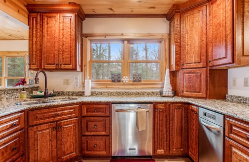 Manitowish Waters House | Lakefront home in a great location with docks, private beach, sauna & firepit