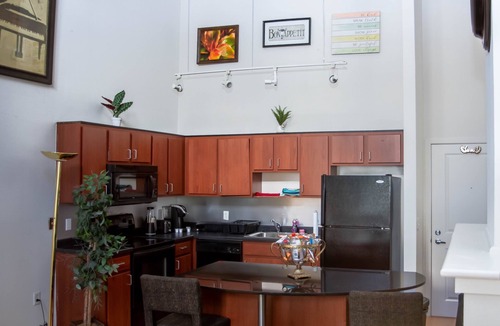 Uptown Condo | Lakeside Haven Minneapolis Loft with BBQ Area, Patio, Central AC, Games, W & D