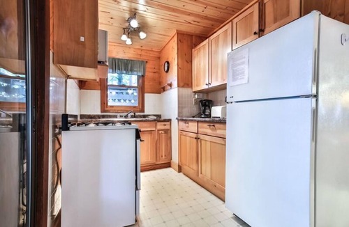 St Germain Cabin | Lakeside resort cabin right on Little Saint with dock, sandy beach, firepit!