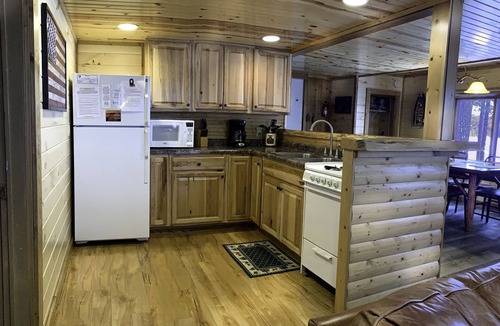 St Germain Cabin | Lakeside resort cabin right on Little Saint with dock, sandy beach, firepit!