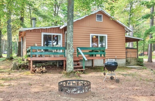 St Germain Cabin | Lakeside resort cabin right on Little Saint with dock, sandy beach, firepit!