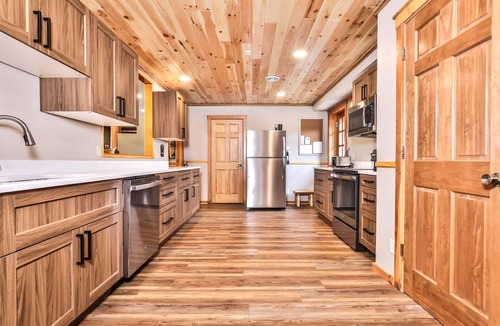 Arbor Vitae House | Large lakeside home with private dock and firepit!