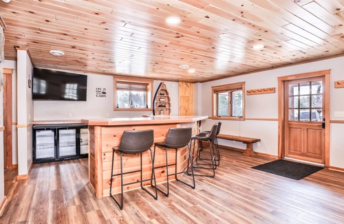 Arbor Vitae House | Large lakeside home with private dock and firepit!