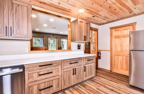Arbor Vitae House | Large lakeside home with private dock and firepit!