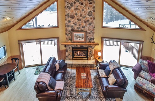 St Germain House | Large lakeside home with hot tub, gazebo, dock, firepit, and fenced in yard!