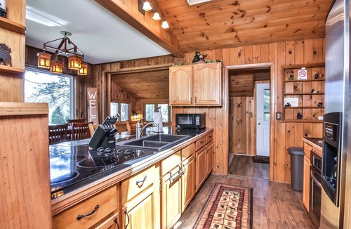 St Germain House | Level lakefront property with spacious cabin, private dock, and fire pit!