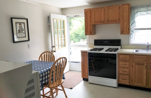 Falmouth Condo | Location, Location! New listing Steps to Surf Drive Beach, sleeps 5,deck, yard