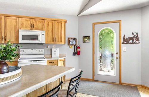 Brill Condo | Long Lake Landing – Unit 3 | Spacious Lakeview Condo with Private Boat Slip