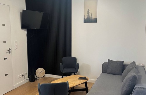 Louvres Apartment | Lovely, cosy apartment with garden and king-size bed, near airport.