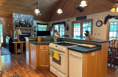 Burtrum House | Lovely lakefront home-zero entry shoreline. Pontoon and snowmobile trail access.