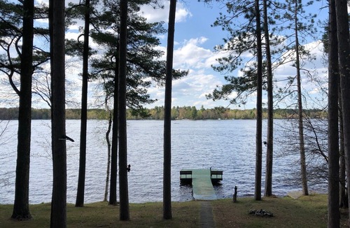 Eagle River House | Lovely Open-Concept Home on Catfish Lake w/Guest Cottage