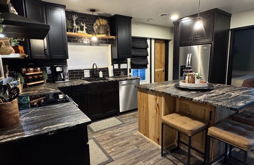 Crivitz Cabin | Luxury creekside cabin near High Falls with views, fire pit & trails nearby
