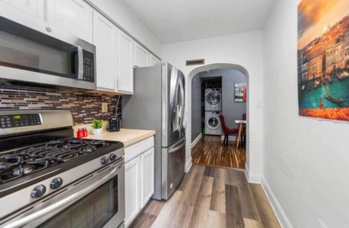 Little Italy House | Make unforgettable memories in this spacious 5-bedroom, 2-bathroom home in Baltimore’s downtown district. Just steps from Little Italy, this Airbnb offers free parking, modern amenities, and plenty of space for families or large groups to relax.