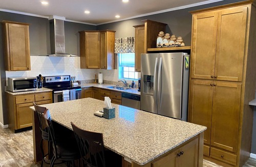Marinette House | Modern Home on Trout Creek in Peshtigo “Fire City” w/Spacious Backyard & Deck!